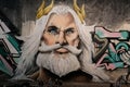 Graffiti of a powerful, mythical figure with long white hair. Leake street, UK Royalty Free Stock Photo