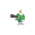 Character sailor holding binocular in the green christmas ball