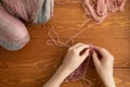 Character Woman Knitting Scarf with Pink Thread Royalty Free Stock Photo