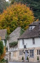 Characterful, historic houses in Castle Combe, picturesque village in Wiltshire in the Cotswolds, UK. Photographed in autumn. Royalty Free Stock Photo