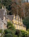 Characterful, historic houses in Castle Combe, picturesque village in Wiltshire in the Cotswolds, UK. Photographed in autumn. Royalty Free Stock Photo