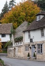 Characterful, historic houses in Castle Combe, picturesque village in Wiltshire in the Cotswolds, UK. Photographed in autumn. Royalty Free Stock Photo