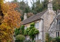 Characterful, historic sandstone houses in Castle Combe, picturesque village in Wiltshire in the Cotswolds UK Royalty Free Stock Photo