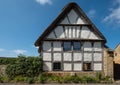 Half timbered cottage in the unspoilt picturesque Cotswold village of Stanton in Gloucestershire UK. Royalty Free Stock Photo