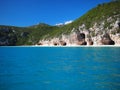 Characteristic caves of Cala Luna beach Royalty Free Stock Photo