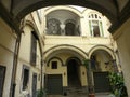 Traditional courtyard of an ancient building of Naples in Italy.