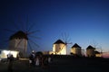 Characteristic and famous windmills at night in the small town of Chora