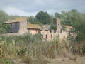 Characteristic farm with a medieval tower in the Roman countryside in Italy.