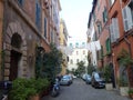 Characteristic street of the district Trastevere to Rome in Italy. Royalty Free Stock Photo