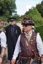 Characters from Steampunk Weekend marching at Belvoir Castle while dressed traditionally