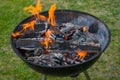 Charcoal barbecue grill, mobile brazier, burning wood