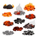 Charcoal black embers pile and hot rocks burn in fireplace with red bright flame, ash and smoke, burnt glowing stones Royalty Free Stock Photo