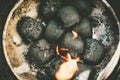 Charcoal briquettes in a barbecue Royalty Free Stock Photo
