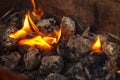 Charcoal briquettes ready for barbecue grill. Royalty Free Stock Photo