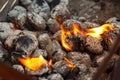 Charcoal briquettes ready for barbecue grill. Royalty Free Stock Photo