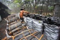 Charcoal factory worker Royalty Free Stock Photo