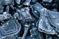 Charcoal in frost background. Frozen coal texture.Heating season.First frosts and colds.coal in hoarfrost close-up Royalty Free Stock Photo