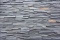 charcoal grey schist wall, subtle sheen