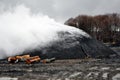 Charcoal pile burning Royalty Free Stock Photo