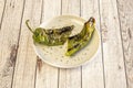 Charcoal-roasted green pepper halved