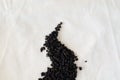 Charcoal roasted high mountain oolong tea. Lao Cha Wan tea from Taiwan on linen background. Top view