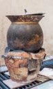 Charcoal stove with sticky rice cooking pot