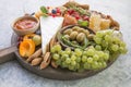 Charcuterie board. Cheese platter. Assortment of tasty appetizers or antipasti. Top view. Copy space Royalty Free Stock Photo