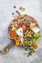 Charcuterie board. Cheese platter. Assortment of tasty appetizers or antipasti. Top view. Copy space Royalty Free Stock Photo