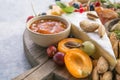 Charcuterie board. Cheese platter. Assortment of tasty appetizers or antipasti. Top view. Copy space Royalty Free Stock Photo