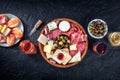 Charcuterie and cheese board, overhead flat lay shot with copy space