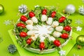 Charcuterie wreath in traditional New Year color design with Christmas decorations. Modern snack Royalty Free Stock Photo