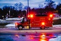 Chardon, Ohio, USA - 2-21-22: An ambulance rushes by to respond to an emergency