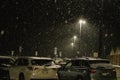 Chardon, Ohio, USA - 2-12-22: A snow-covered Walmart parking lot at night, during a severe snowstorm