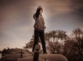 Boy Standing On Top of Army Tank Royalty Free Stock Photo
