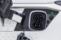 Charge port on an electric car, Ev Charging Port on electric car. Electronic car charging devise publicly installed. EV charger o