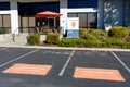 ChargePoint headquarters buidling facade, exterior and dedicated visitor parking spot. ChargePoint is an electric vehicle