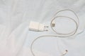 charger for the phone. white wire. Cord. electronics. Royalty Free Stock Photo