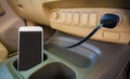 Charger plug phone on car. Royalty Free Stock Photo