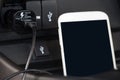 Charger plug phone on car Royalty Free Stock Photo