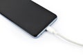 The charger for the smartphone is isolated on a white background, perfect for presentations. Royalty Free Stock Photo