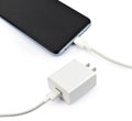 The charger for the smartphone is isolated on a white background, perfect for presentations. Royalty Free Stock Photo