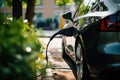 Charging an electric car on a city street