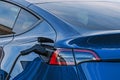 Charging electric car, close-up Royalty Free Stock Photo