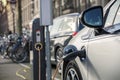 Charging an electric car in public station Royalty Free Stock Photo