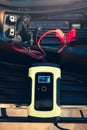 Charging electric power to motorcycle battery.