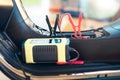 Charging electric power to motorcycle battery.