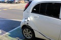 Charging full electric car on public charge station in the city street Royalty Free Stock Photo