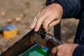 Charging a hunting rifle. Male hunter charges a double-barreled shotgun rounds