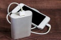 Charging Smartphone With Grey Portable External Battery Powerb