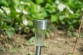 Charging solar lamp on the ground in the garden Royalty Free Stock Photo